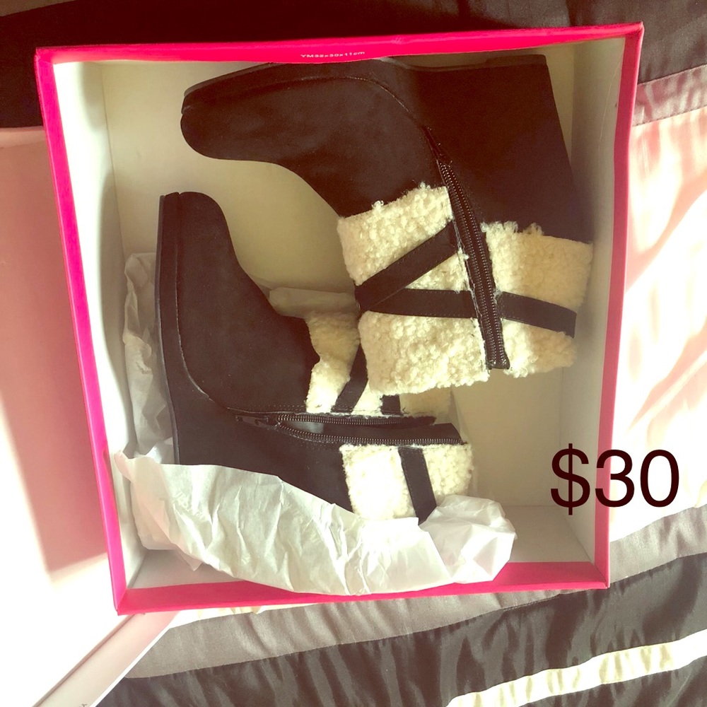 Women’s black and beige booties